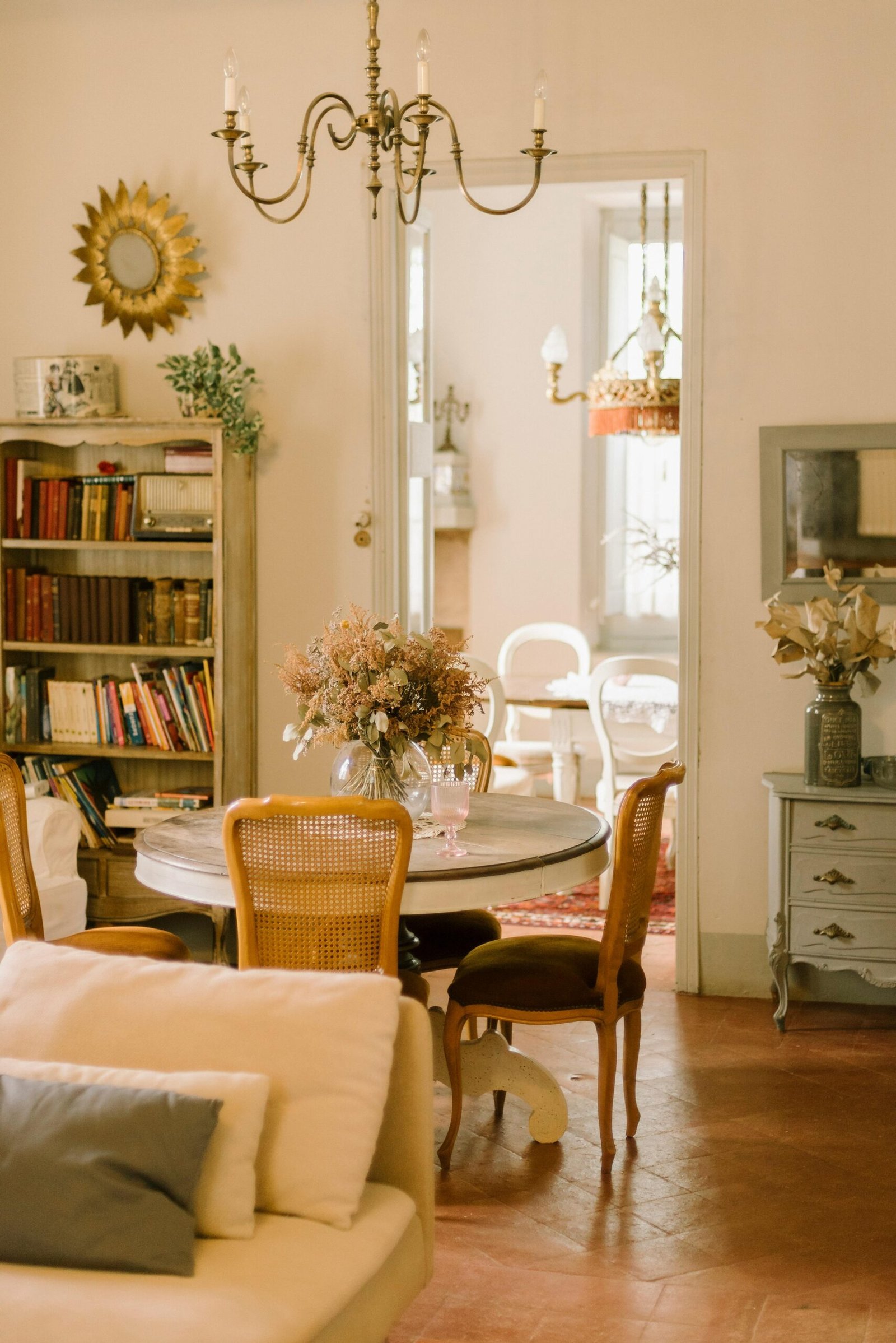 Charming living room interior with vintage furniture and warm lighting for a cozy ambiance.