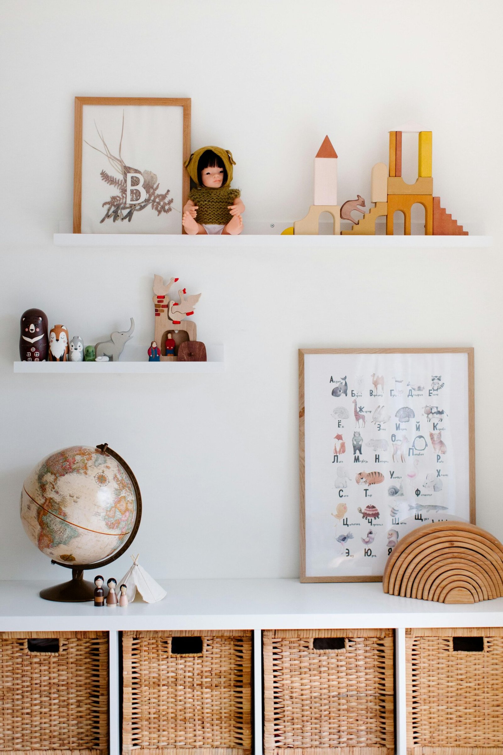 Charming child's room featuring toys, decor, and wicker storage baskets.